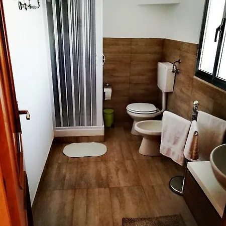 Carmelo B. House *